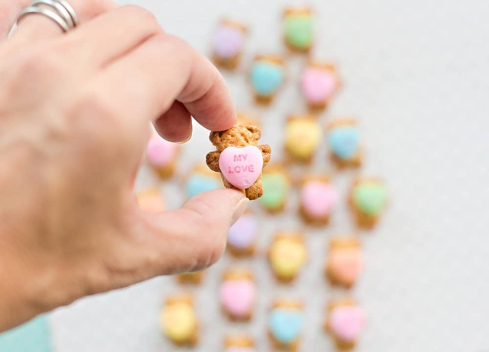 These Adorable Bear Holding Heart Cookies make a an cute and easy Valentine treat for kids or school lunch snack they can make themselves.