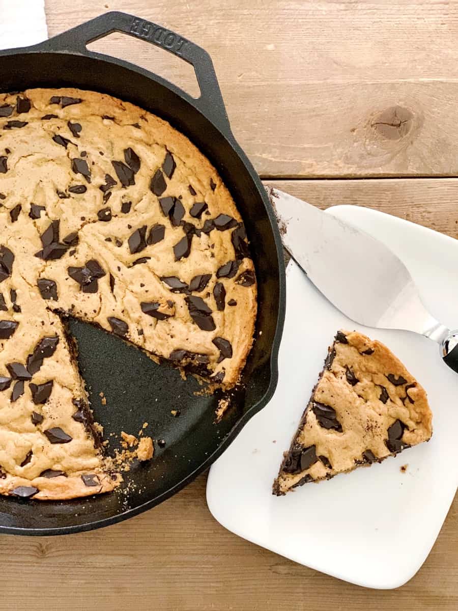 This gooey and delicious One Bowl Skillet Chocolate Chip Cookie comes together easily in one bowl and is a crowd-favorite dessert for kids and adults!