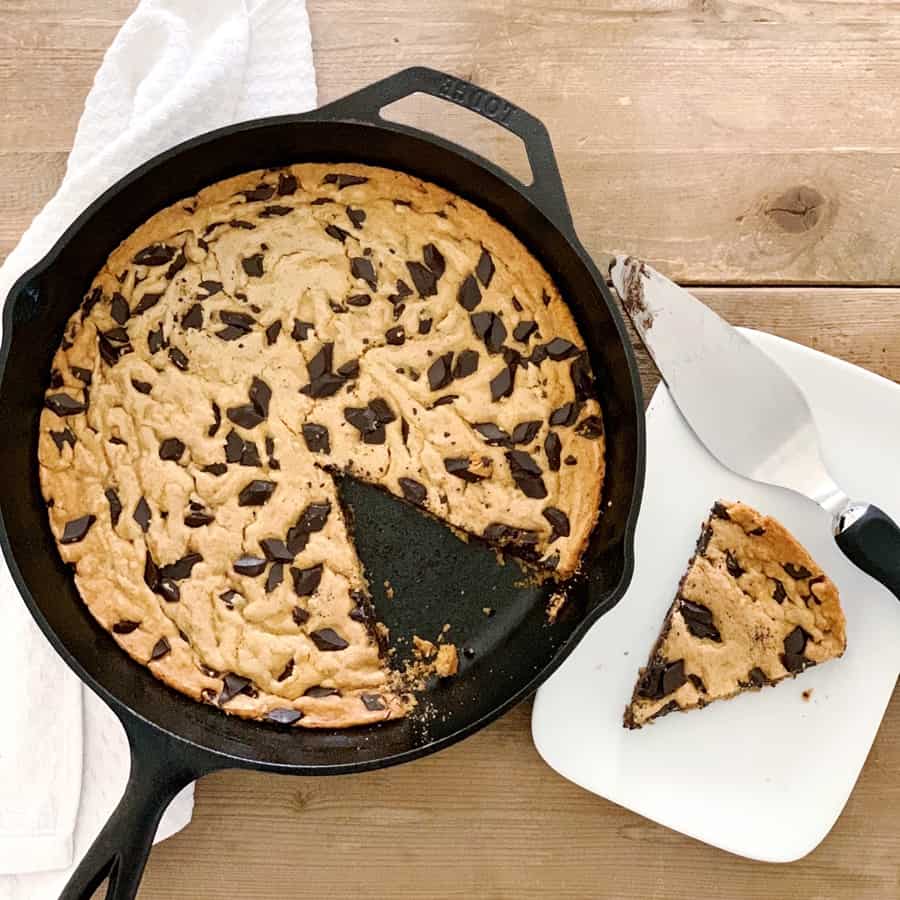 This gooey and delicious One Bowl Skillet Chocolate Chip Cookie comes together easily in one bowl and is a crowd-favorite dessert for kids and adults!