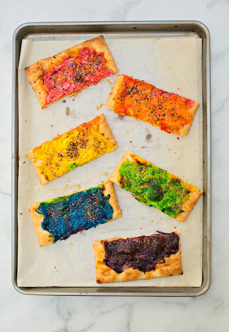 Our Rainbow Glitter Unicorn Pizza is the (easiest!) most magical pizza you'll ever eat. This stunning snack will be the healthy hightight of your party!