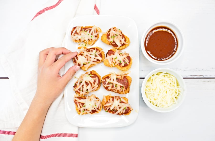 Serve up these crowd-pleasing easy chicken parmesan bites for a lunch or dinner that will get two-thumbs up from the whole family. 