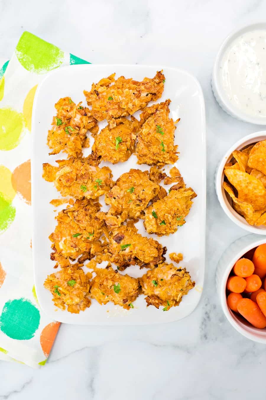 These Barbecue Ranch Potato Chip Chicken Tenders are healthier than fried chicken nuggets and make a great kid lunch or dinner.