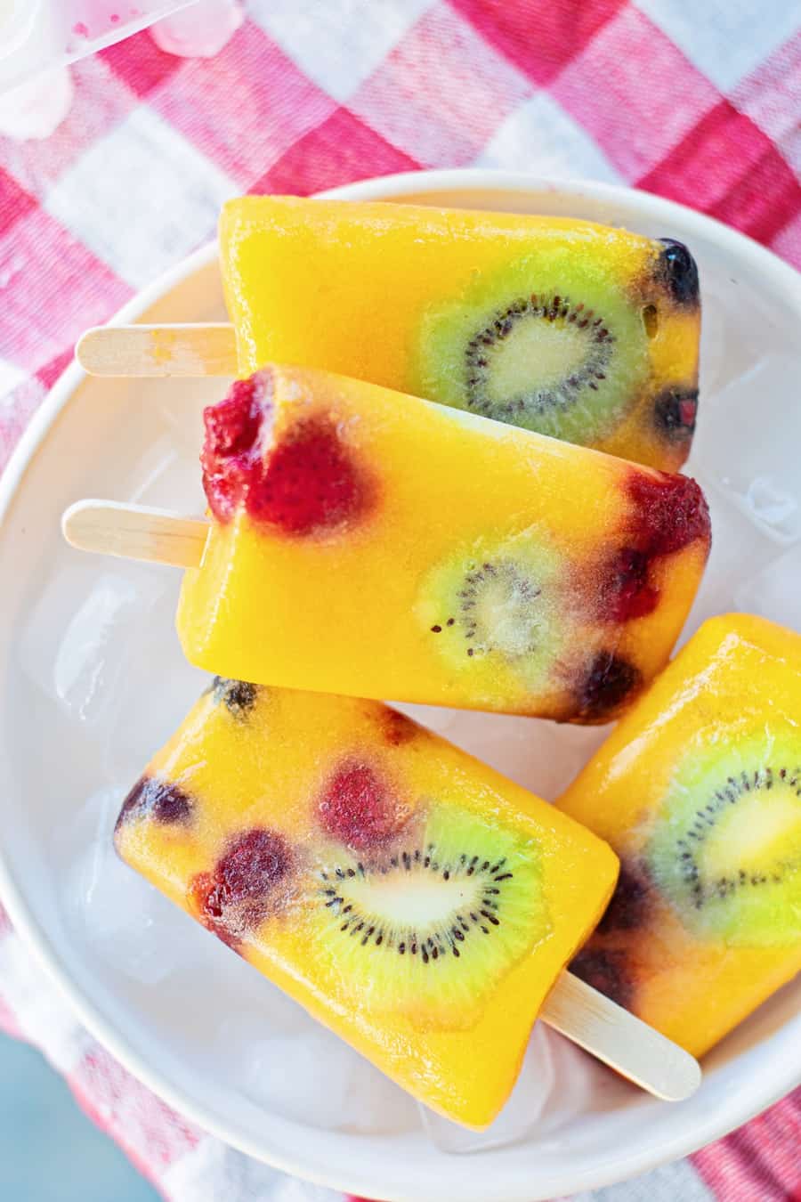 mango fruit popsicles with kiwi and berries