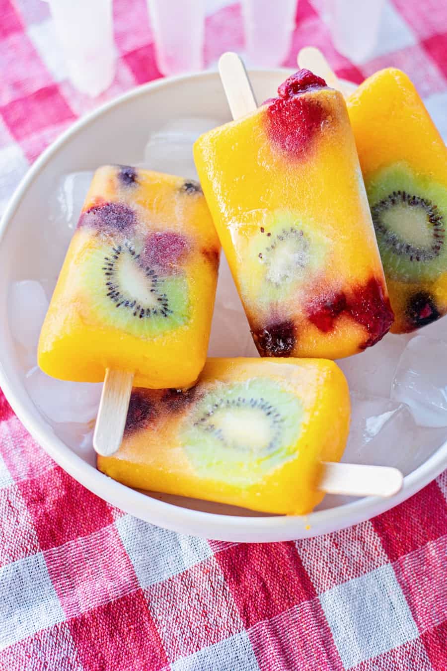 mango fruit popsicles with kiwi and berries