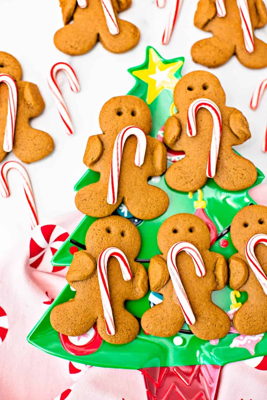 Gingerbread Holding Candy Canes Cookies