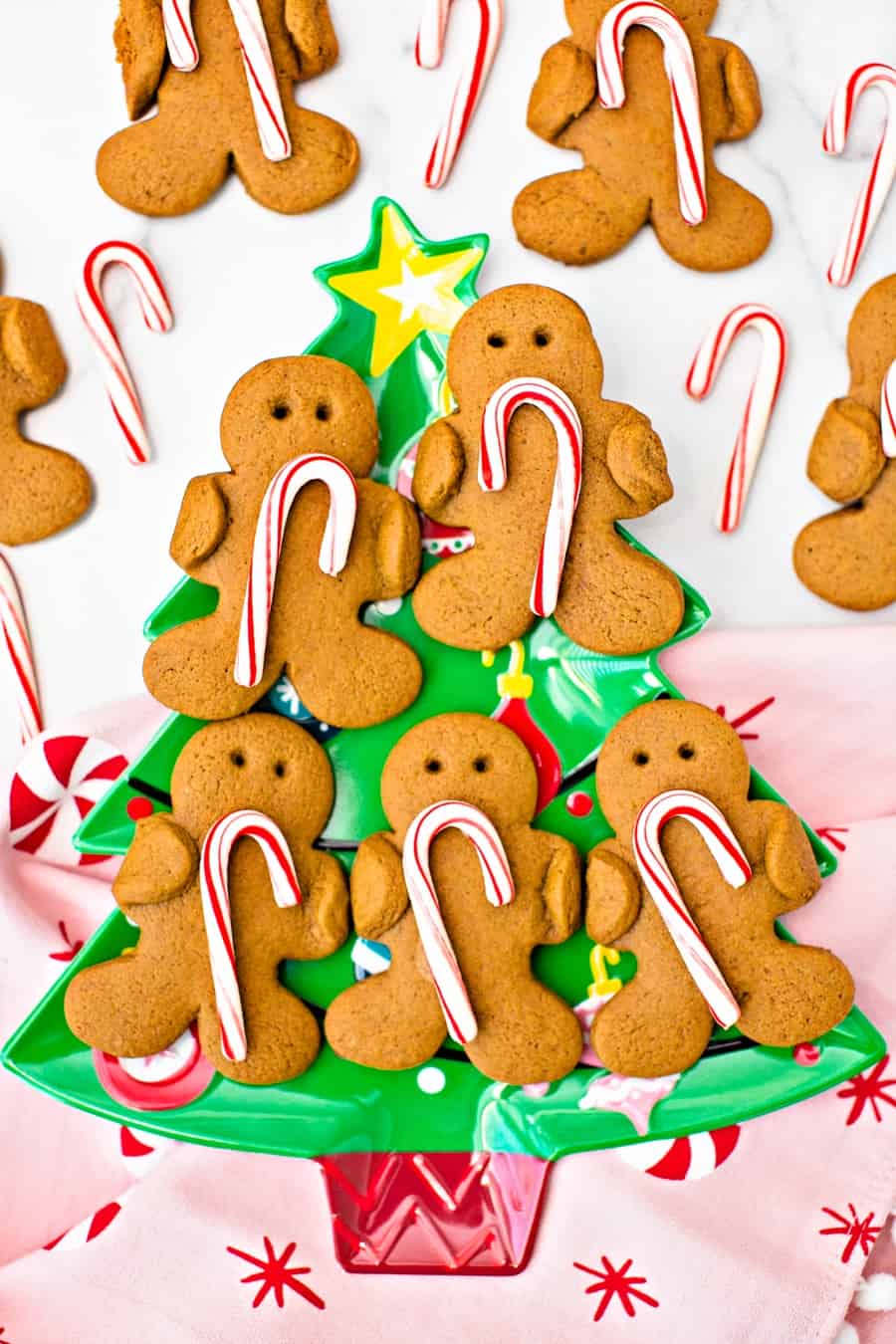 Gingerbread Holding Candy Canes Cookies