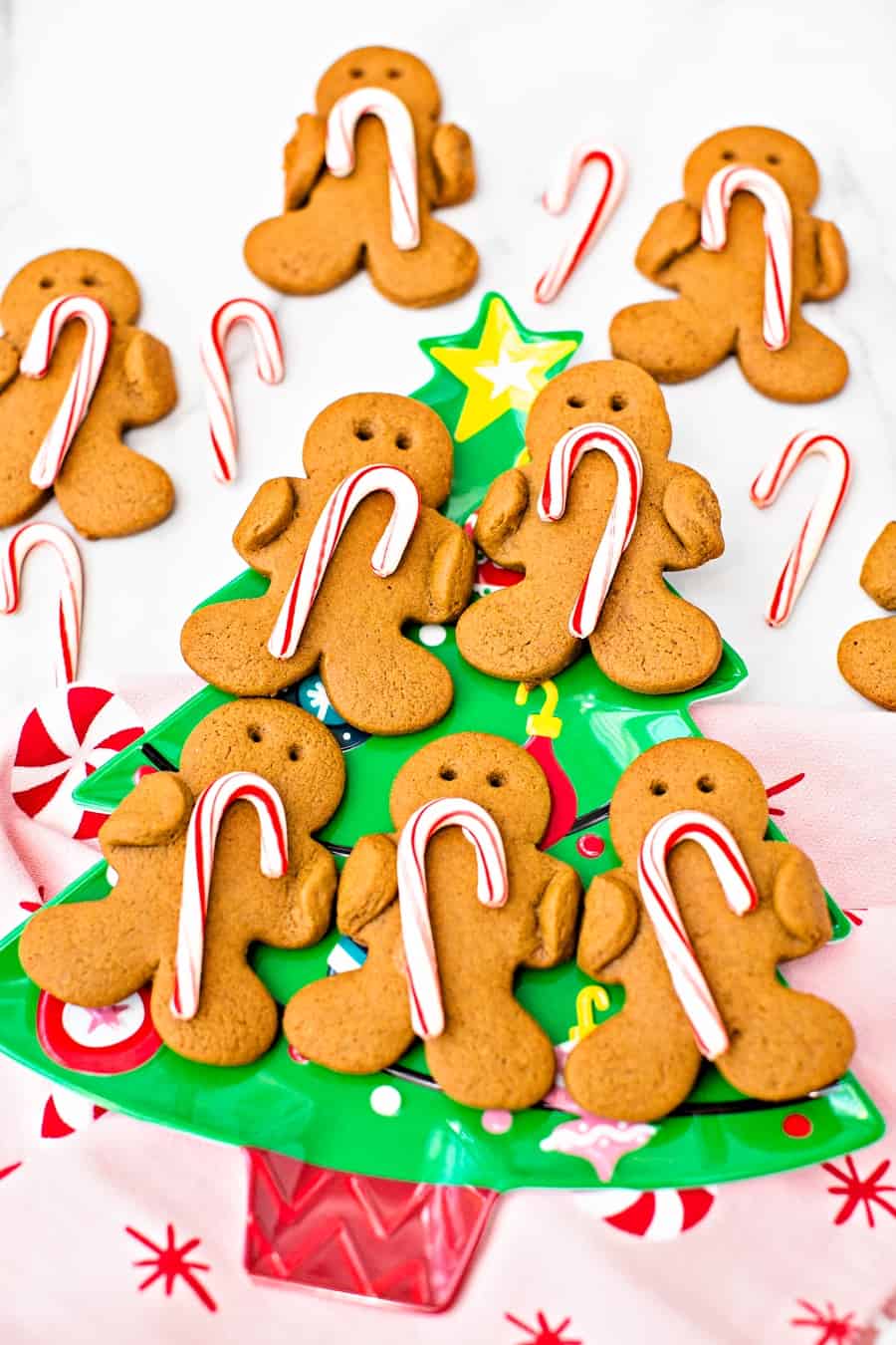 Gingerbread Holding Candy Canes Cookies