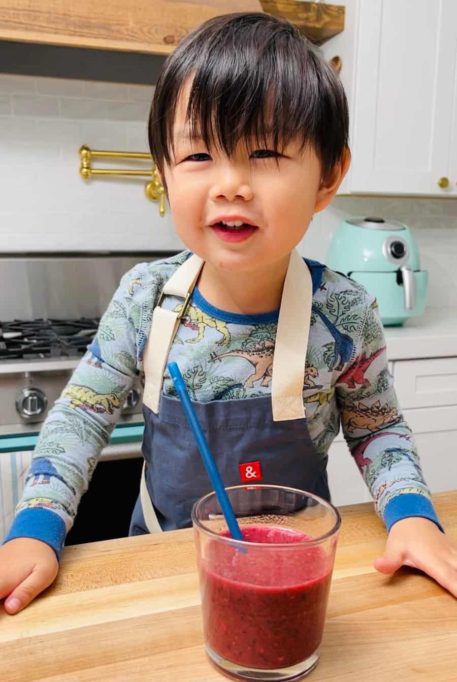 kids making berry smoothies based on nature's cereal
