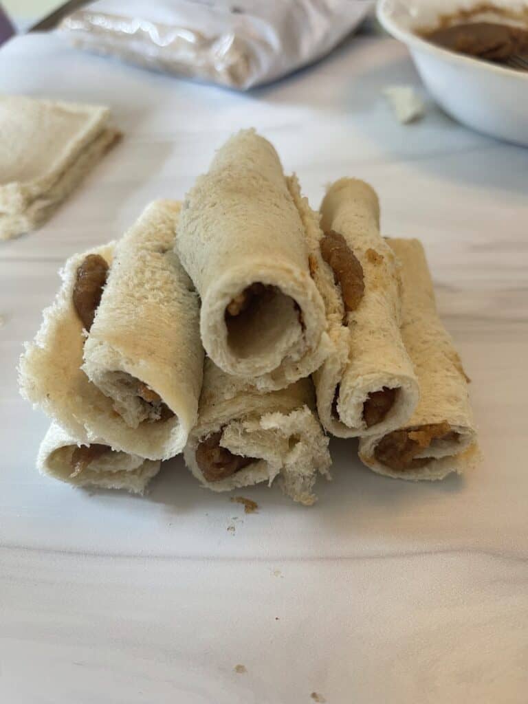 bread rolled up with cinnamon mixture