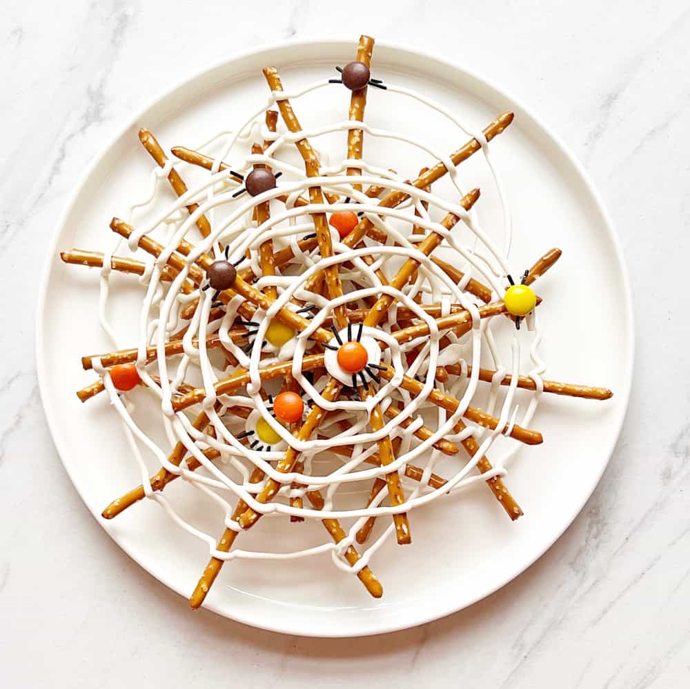 Chocolate Pretzel Spiderwebs Are The Perfect Sweet and Salty Halloween Treat